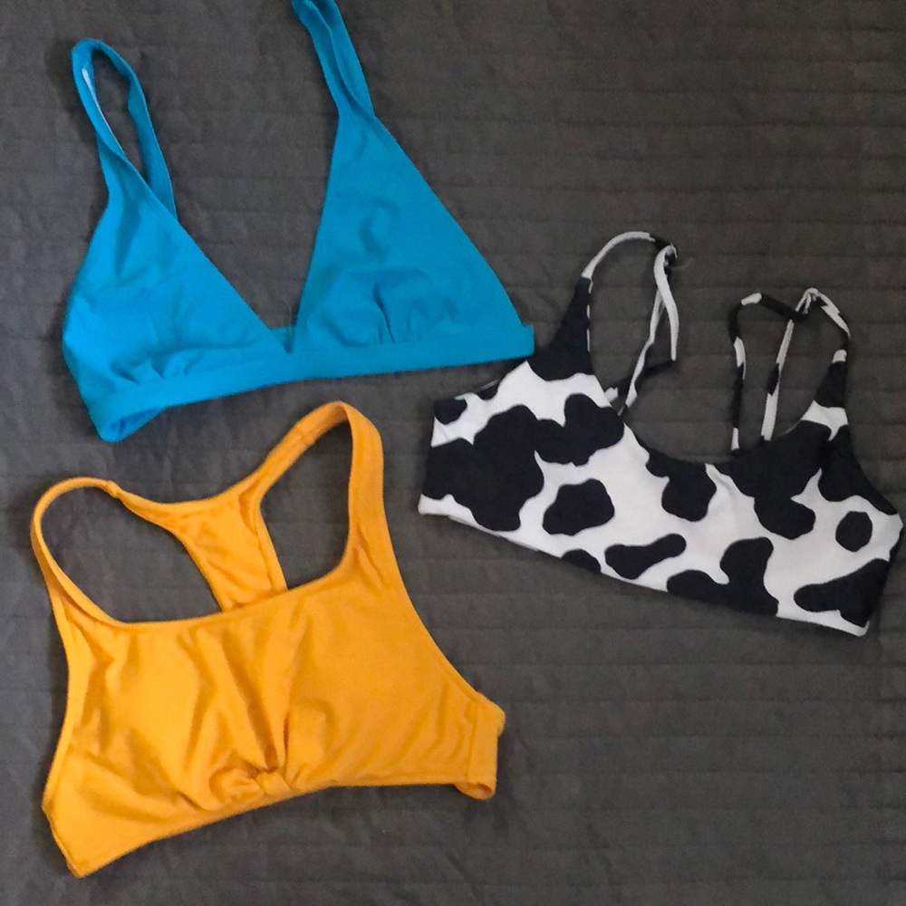 Lot of swimsuit tips. Sz small. Cow print, Teri and athletic style.
